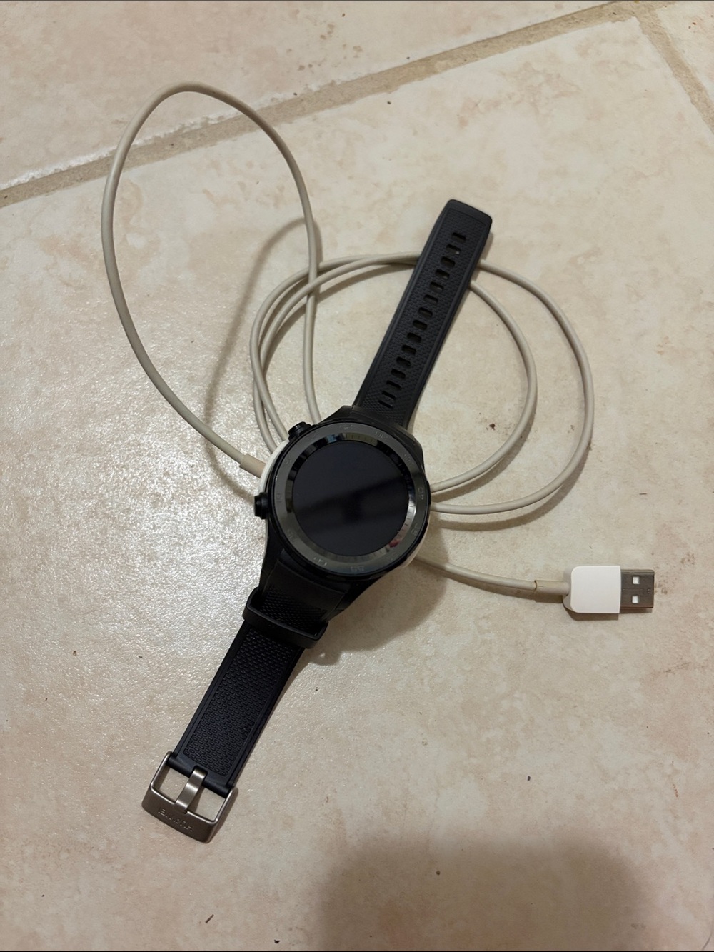Black Smartwatch with USB Charging Cable